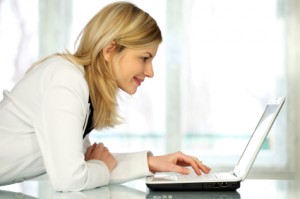 Woman browsing nyc beauty buzz on facebook